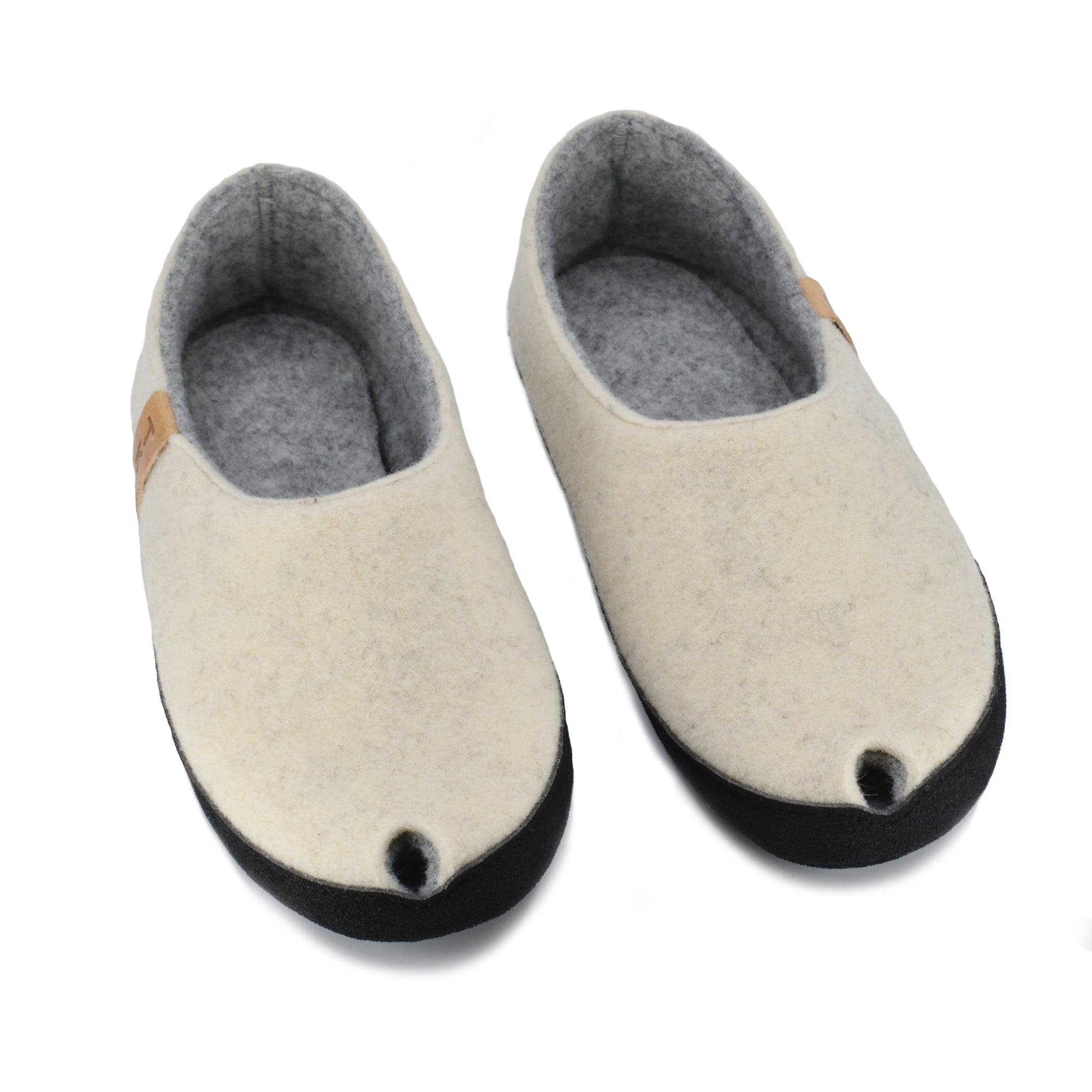 TOKU Budapest · lambswool slippers · handmade in Estonia · arch-support slippers · warm felt shoes · slow fashion · Estonian design · cozy home footwear